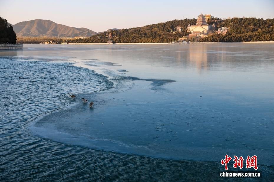 皇冠信用盘在线申请_北京颐和园呈现“金光穿洞”景观